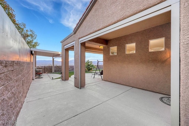 view of patio / terrace with fence