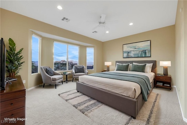 bedroom featuring recessed lighting, visible vents, baseboards, and light colored carpet