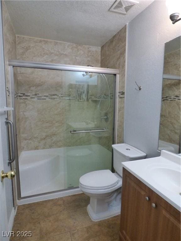 5044 S Rainbow Blvd Unit 106, Las Vegas, NV 89118 - bathroom featuring vanity, a textured ceiling, visible vents, and a stall shower