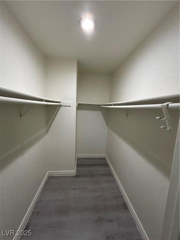 5044 S Rainbow Blvd Unit 106, Las Vegas, NV 89118 - walk in closet featuring wood finished floors