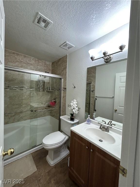 5044 S Rainbow Blvd Unit 106, Las Vegas, NV 89118 - full bath with a textured ceiling, visible vents, and a stall shower