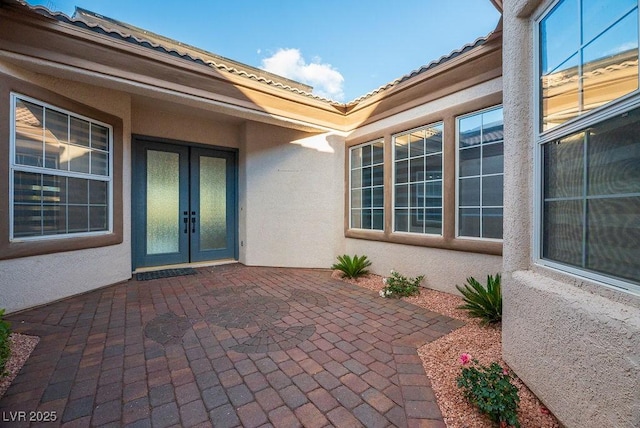 view of patio featuring french doors