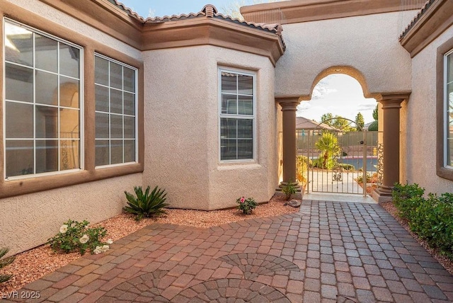 view of patio / terrace featuring a gate