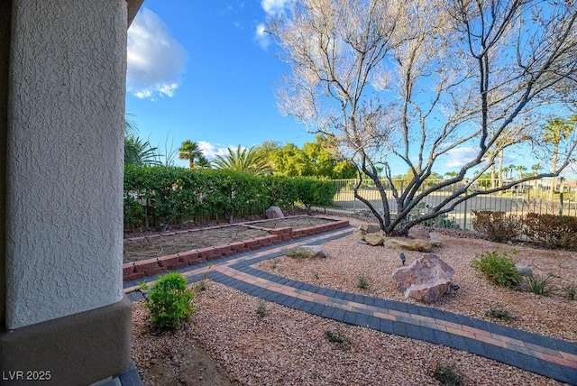 view of yard featuring fence