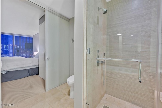 full bath with a stall shower, toilet, ensuite bath, and tile patterned floors