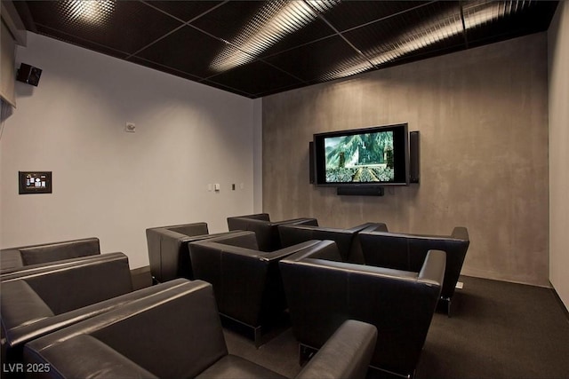 home theater room featuring carpet flooring