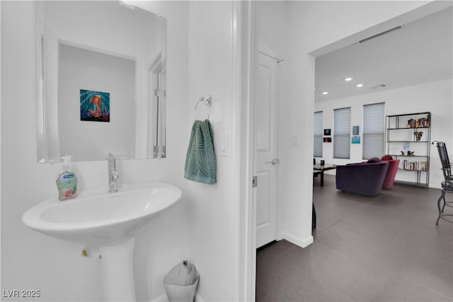 bathroom with visible vents and recessed lighting