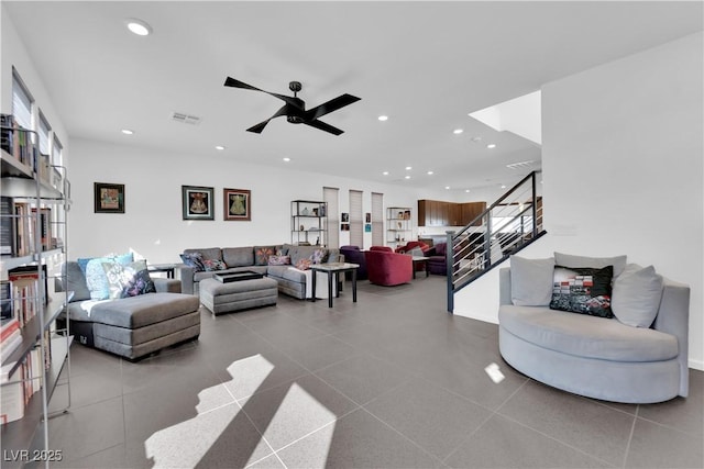 tiled living area featuring stairs, ceiling fan, visible vents, and recessed lighting