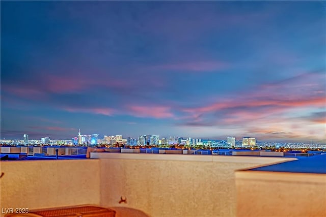 view of water feature with a city view