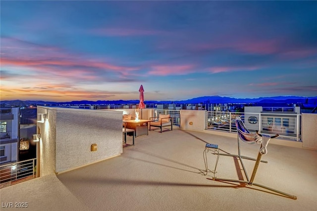 view of patio / terrace featuring a balcony and a mountain view