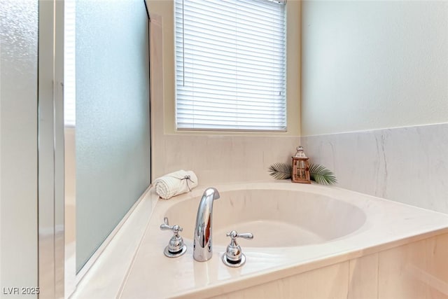 full bathroom featuring a garden tub