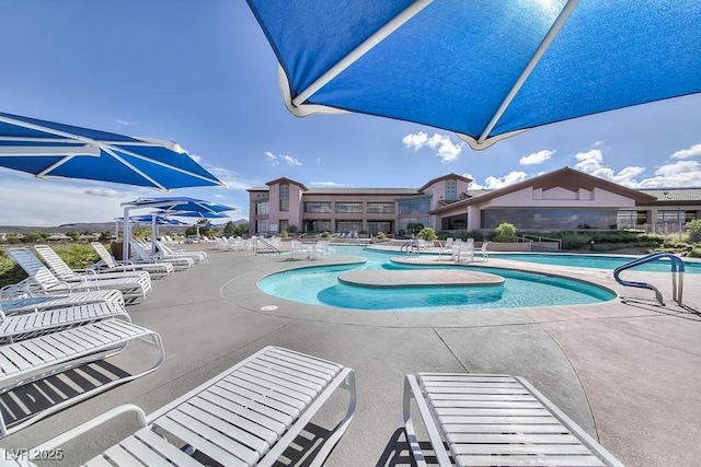 pool with a patio area