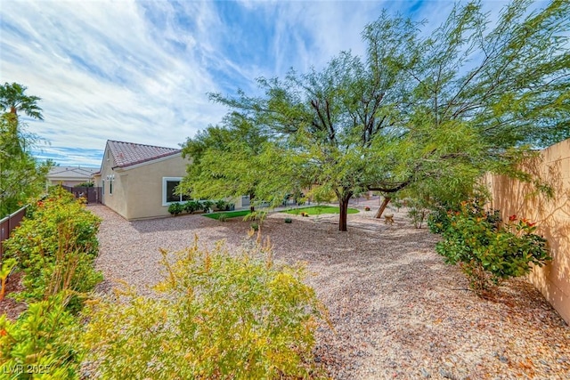 view of yard with fence