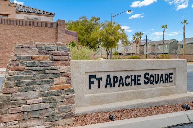 community / neighborhood sign featuring a residential view