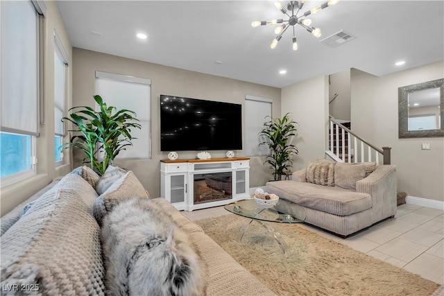 tiled living room with recessed lighting, visible vents, a chandelier, baseboards, and stairs