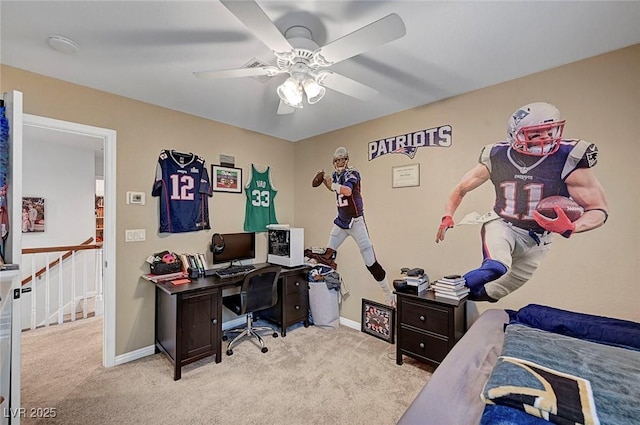 carpeted bedroom featuring baseboards and a ceiling fan