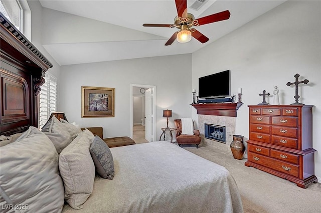 bedroom featuring a fireplace, visible vents, light carpet, ceiling fan, and high vaulted ceiling