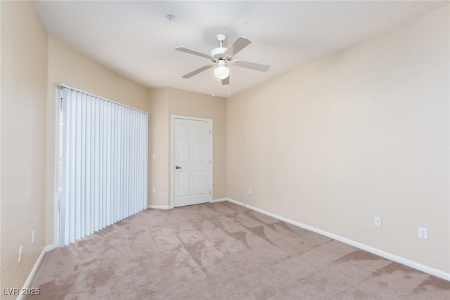 unfurnished bedroom with a ceiling fan, baseboards, and carpet flooring