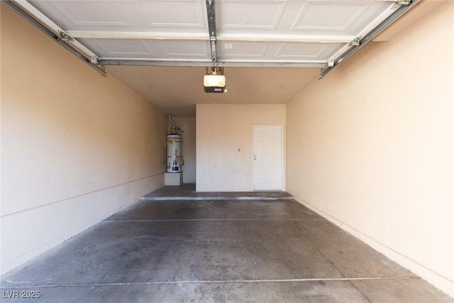 garage with water heater and a garage door opener