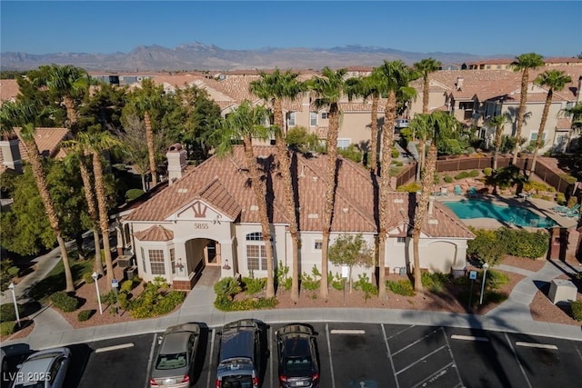 birds eye view of property featuring a residential view and a mountain view