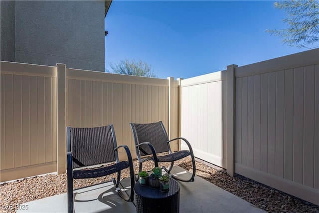 view of patio with fence