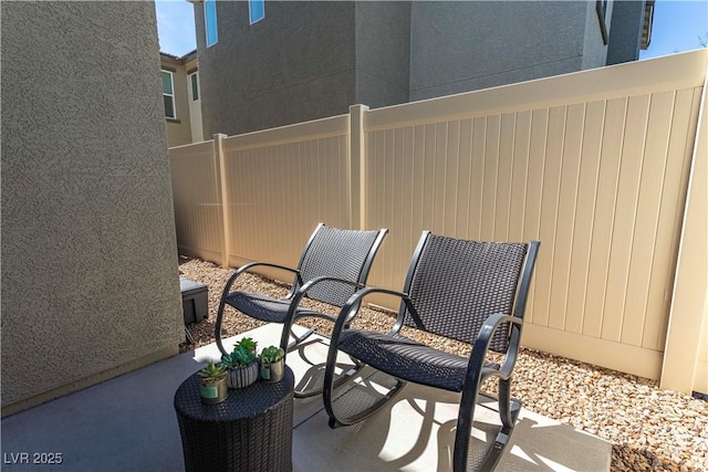 view of patio / terrace with fence