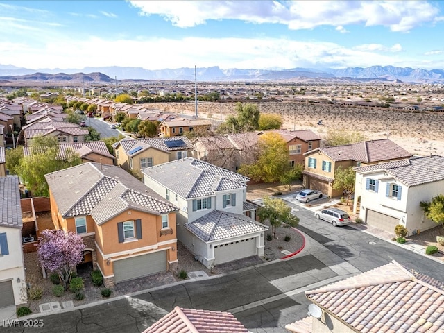 aerial view featuring a residential view and a mountain view