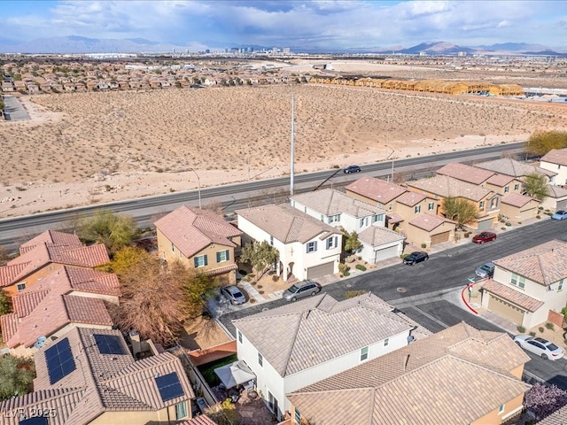 bird's eye view featuring a residential view and a mountain view