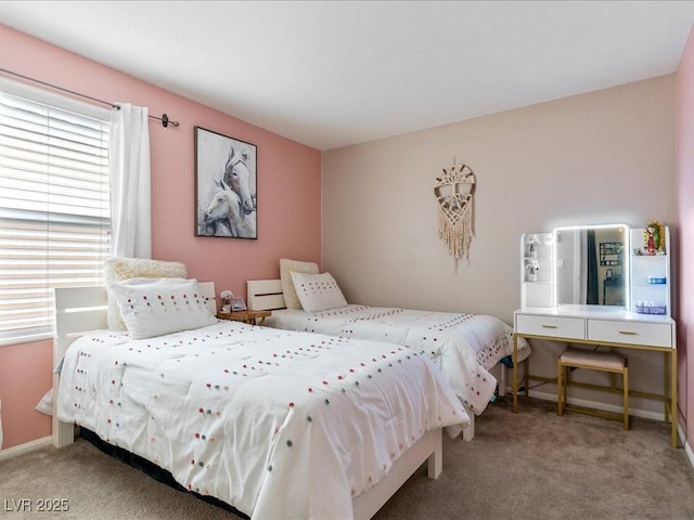 bedroom with carpet and baseboards