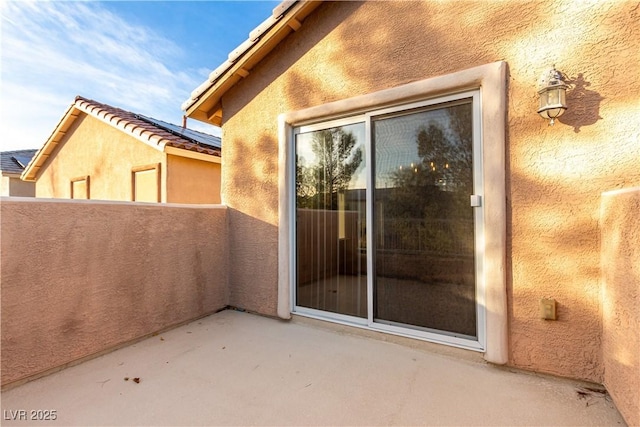 exterior space featuring a balcony