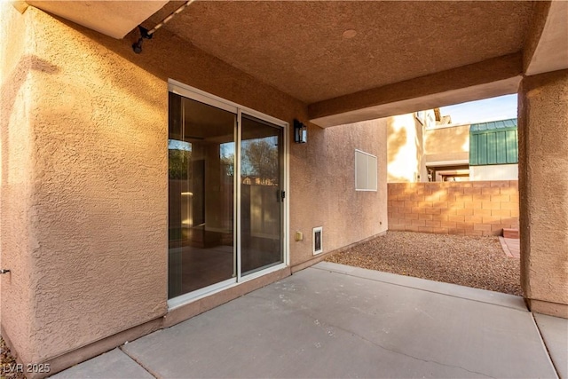 view of patio with fence