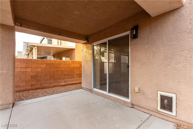 view of patio with fence