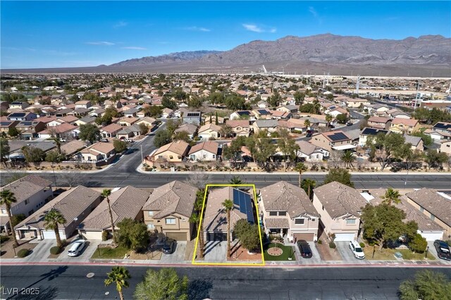 bird's eye view with a residential view and a mountain view