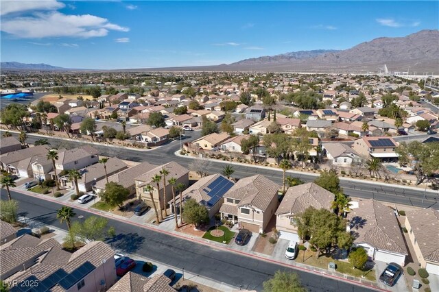 bird's eye view featuring a residential view and a mountain view