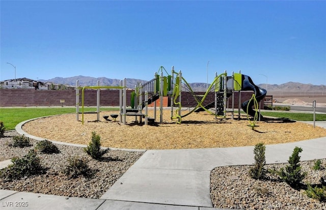 community play area featuring a mountain view