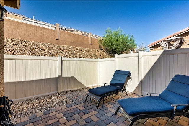 view of patio with a fenced backyard