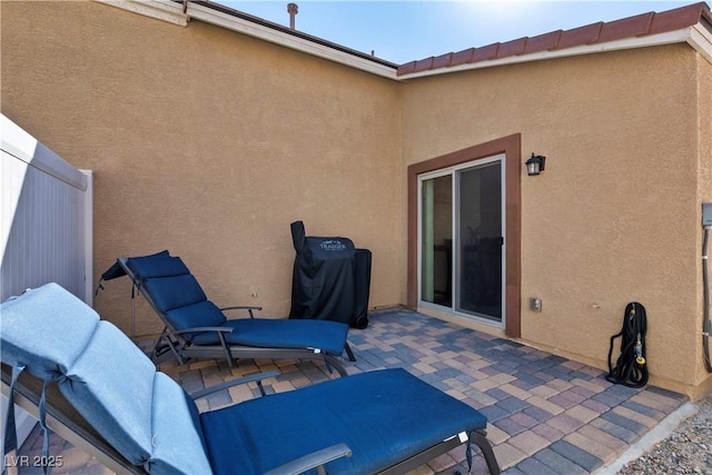 view of patio / terrace with fence