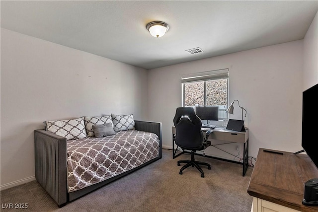 carpeted bedroom with visible vents and baseboards