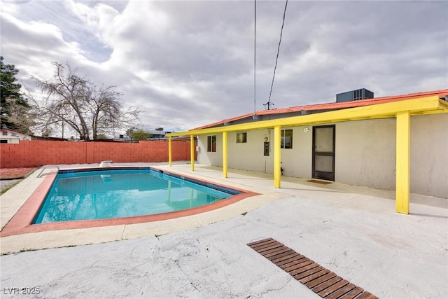 view of swimming pool with a patio, a fenced backyard, and a fenced in pool