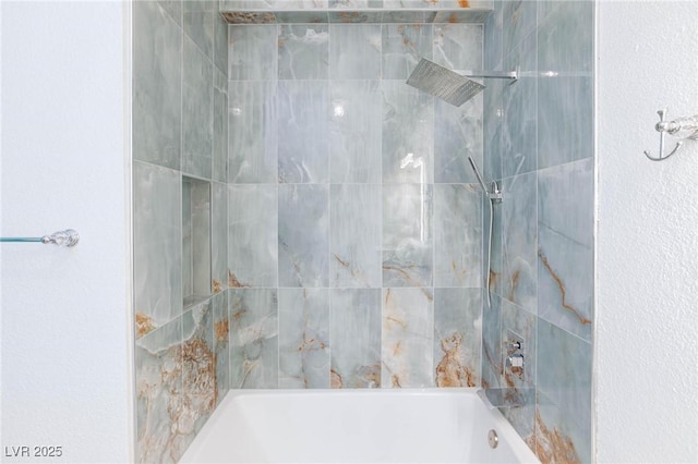 bathroom with shower / bath combination