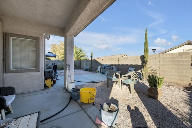 view of patio / terrace featuring a fenced backyard