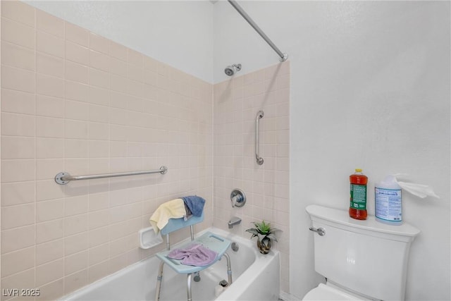 bathroom with shower / bath combination and toilet