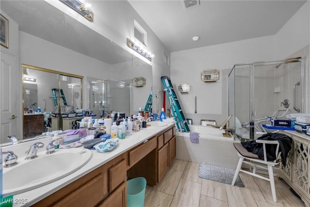 bathroom featuring double vanity, a stall shower, visible vents, a sink, and a bath