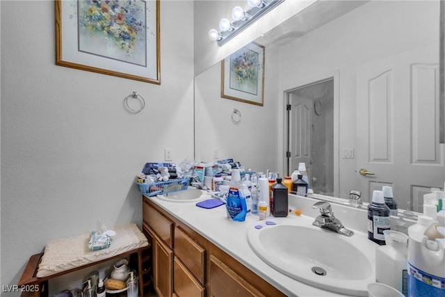 bathroom with double vanity and a sink