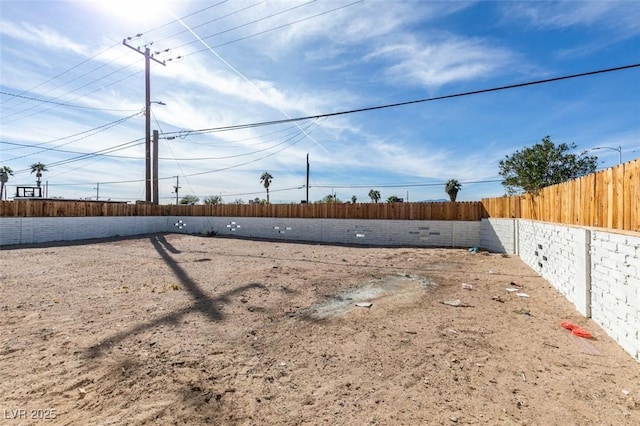 view of yard featuring a fenced backyard
