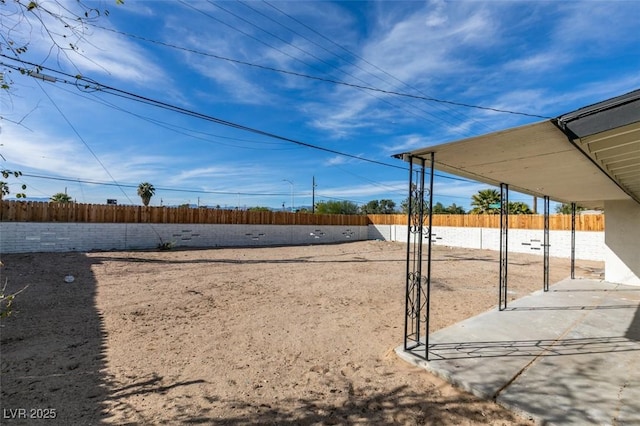 view of yard with fence