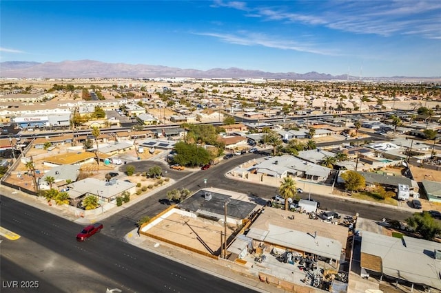birds eye view of property with a residential view and a mountain view