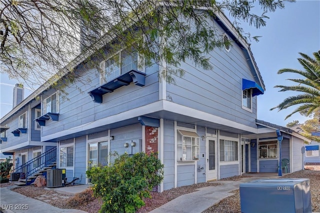 view of front of house featuring central AC unit