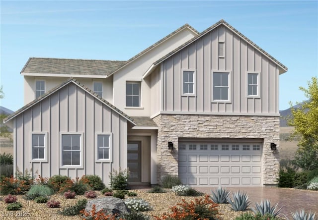 view of front facade with driveway, stone siding, a garage, and board and batten siding