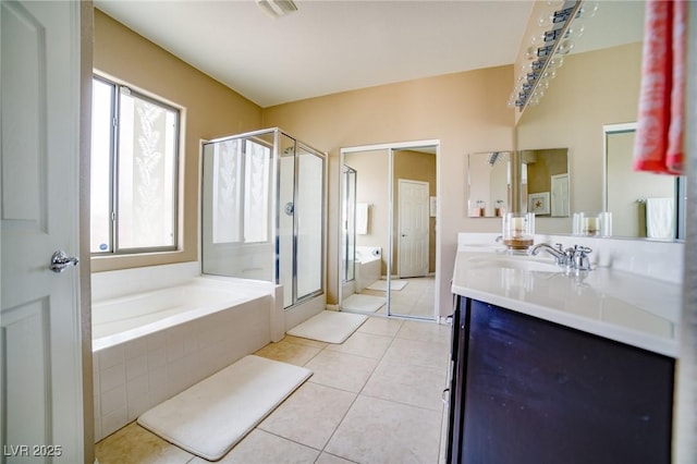 bathroom featuring a garden tub, visible vents, a stall shower, vanity, and tile patterned floors